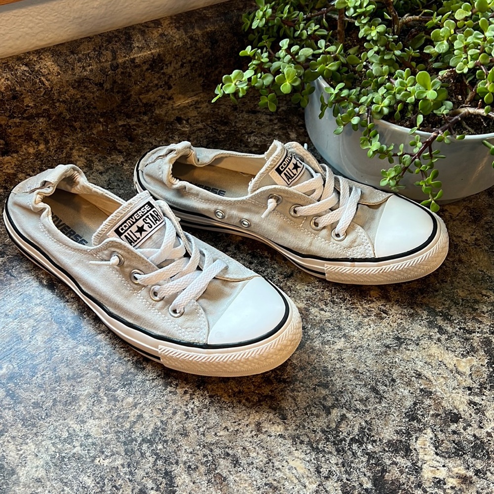Gray shoreline converse